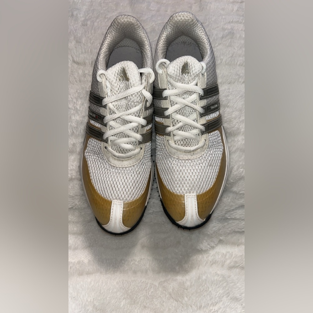 Adidas Traxion Lite S 50/50 Protect women's golf shoes.